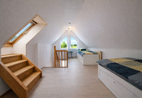 Schlafzimmer mit getrennten Betten