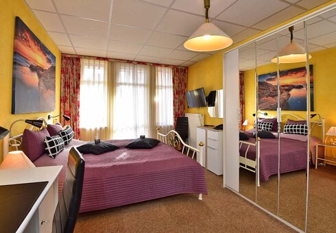 Blick in ein Dreibettzimmer