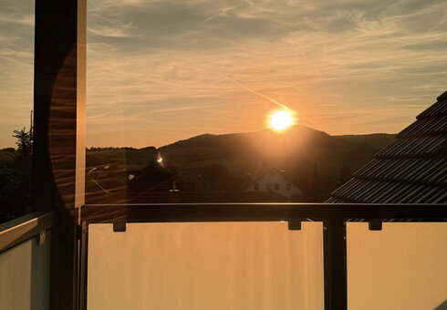 Sonnenuntergang vom Balkon