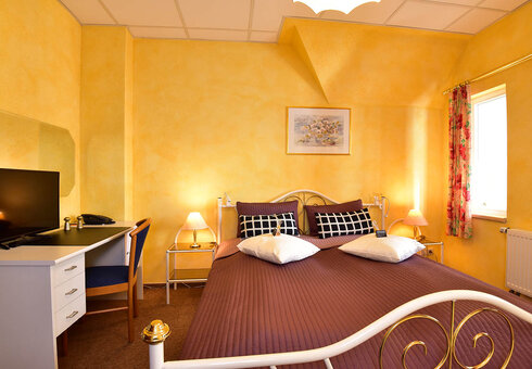 Blick in ein Dreibettzimmer