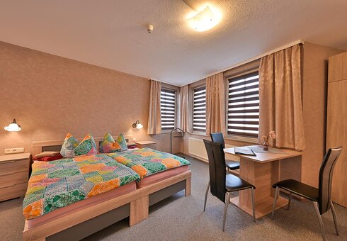 Blick in ein Dreibettzimmer