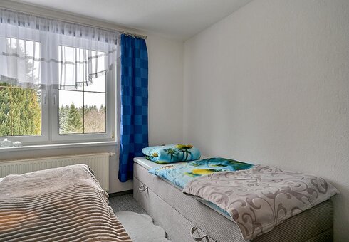 weiteres Bett im Schlafzimmer