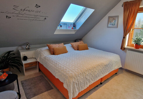 Schlafzimmer in Wohnung 1