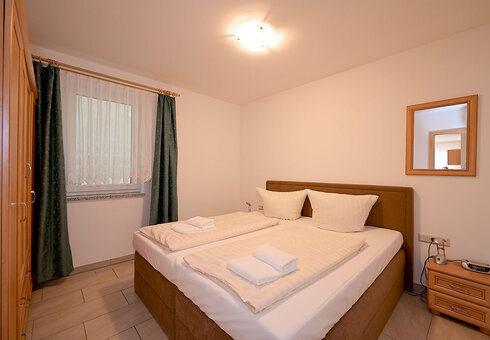 Beispiel Ferienwohnung (Schlafzimmer)