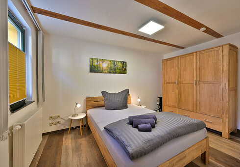 Schlafzimmer mit französischem Bett