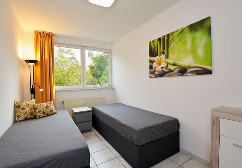 Große Ferienwohnung - Schlafzimmer mit Einzelbetten