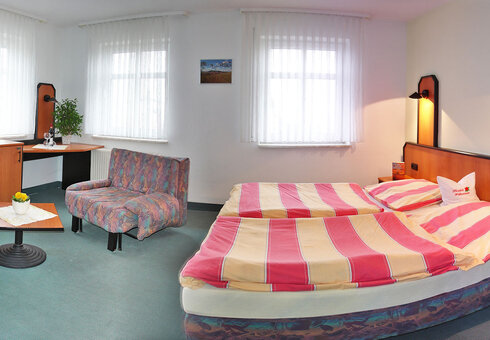 Blick in ein Gästezimmer