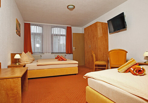 Blick in ein Dreibettzimmer